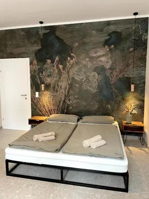 Ein Bett oder Betten in einem Zimmer der Unterkunft Residence K - Spacious Altbau Apartment