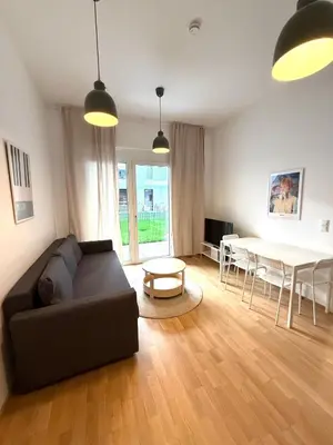 Ein Sitzbereich in der Unterkunft Brand New, Central Apartment with Own Garden