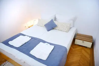Ein Bett oder Betten in einem Zimmer der Unterkunft Barbara Apartment