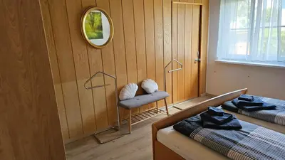 Ein Bett oder Betten in einem Zimmer der Unterkunft Apartmenthaus-Winkler Wiener-Neustadt-Umgebung