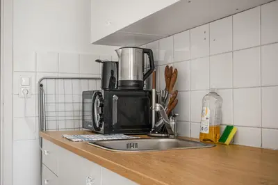 Küche/Küchenzeile in der Unterkunft Comfortable 2BR Apartment Next to Rennweg