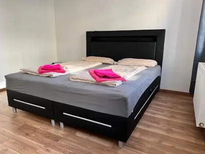 Ein Bett oder Betten in einem Zimmer der Unterkunft Prime location in Vienna - Comfortable 3BR & 1LR Apt