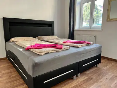 Ein Bett oder Betten in einem Zimmer der Unterkunft Prime location in Vienna - Comfortable 3BR & 1LR Apt