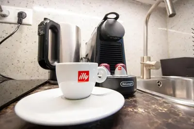 Kaffee-/Teezubehör in der Unterkunft Elegant City Living
