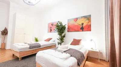 Ein Bett oder Betten in einem Zimmer der Unterkunft Three Bedroom Apartment - Vienna City Center