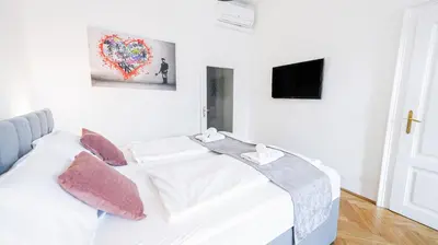 Ein Bett oder Betten in einem Zimmer der Unterkunft Three Bedroom Apartment - Vienna City Center