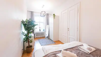 Ein Bett oder Betten in einem Zimmer der Unterkunft Three Bedroom Apartment - Vienna City Center