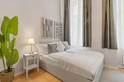 Ein Bett oder Betten in einem Zimmer der Unterkunft Next to Augarten I 7 Min to Metro I Free WIFI