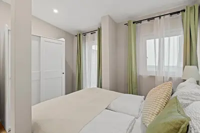 Ein Bett oder Betten in einem Zimmer der Unterkunft Next to Augarten I 7 Min to Metro I Free WIFI
