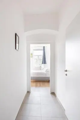 Ein Bett oder Betten in einem Zimmer der Unterkunft Apartment Schönbrunn & Kingsiz Bed