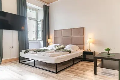 Ein Bett oder Betten in einem Zimmer der Unterkunft Lovely 2BR Apartment, Near U6 Schöpfwerk