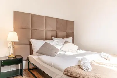 Ein Bett oder Betten in einem Zimmer der Unterkunft Lovely 2BR Apartment, Near U6 Schöpfwerk