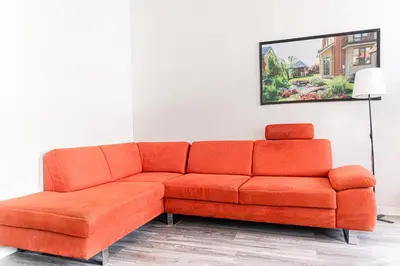Ein Sitzbereich in der Unterkunft Two Modern Apartments Comfortable Stay for Groups