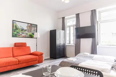 Ein Sitzbereich in der Unterkunft Two Modern Apartments Comfortable Stay for Groups