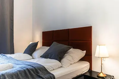 Ein Bett oder Betten in einem Zimmer der Unterkunft Pleasant 2BR Apartment Near U6 Station am Schöpfwerk