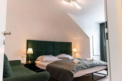Ein Bett oder Betten in einem Zimmer der Unterkunft Beautiful 2BR Apt, Near U6 Station am Schöpfwerk