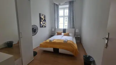 Ein Bett oder Betten in einem Zimmer der Unterkunft Stylish Multi Apt Perfect for Group Stays