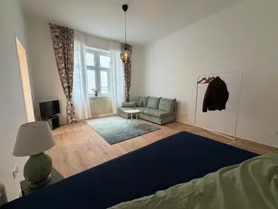 Ein Sitzbereich in der Unterkunft Cosy City Apartment Modern Living in Wien Penzing