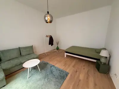 Ein Sitzbereich in der Unterkunft Cosy City Apartment Modern Living in Wien Penzing