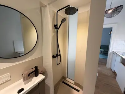 Ein Badezimmer in der Unterkunft Cosy City Apartment Modern Living in Wien Penzing