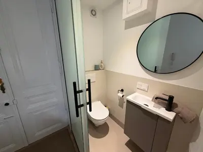 Ein Badezimmer in der Unterkunft Cosy City Apartment Modern Living in Wien Penzing