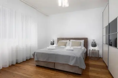 Ein Bett oder Betten in einem Zimmer der Unterkunft Villa Hietzing