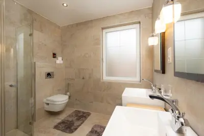 Ein Badezimmer in der Unterkunft Villa Hietzing