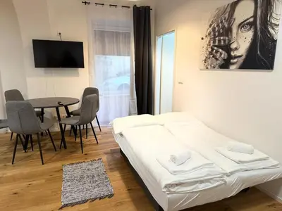 Ein Bett oder Betten in einem Zimmer der Unterkunft City Vienna Hirsch Apartment