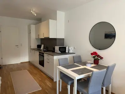 Küche/Küchenzeile in der Unterkunft Modern City Apartment with private Garden