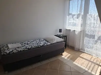 Ein Bett oder Betten in einem Zimmer der Unterkunft Assmayer City Home Apartment Vienna