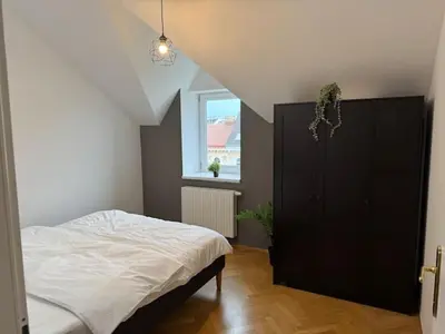 Ein Bett oder Betten in einem Zimmer der Unterkunft 50qm, balcony, near center, Schönbrunn, attic