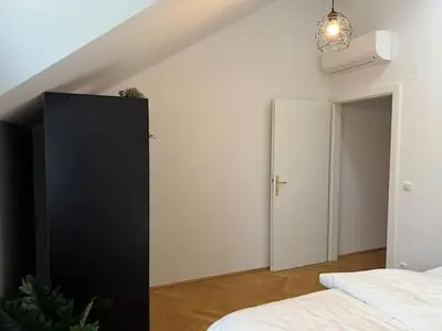 Ein Bett oder Betten in einem Zimmer der Unterkunft 50qm, balcony, near center, Schönbrunn, attic
