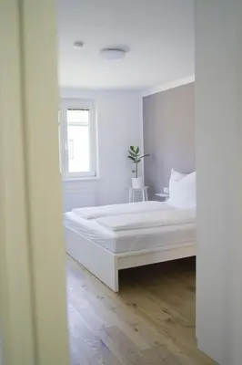 Ein Bett oder Betten in einem Zimmer der Unterkunft Modernes Apartment in Schwechat