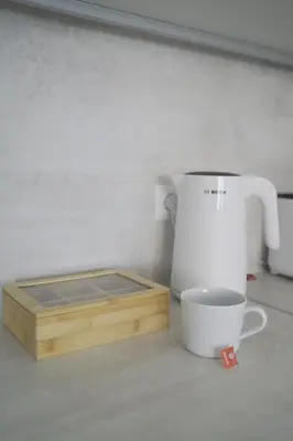 Kaffee-/Teezubehör in der Unterkunft Modernes Apartment in Schwechat
