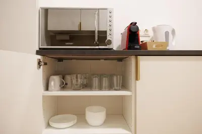 Küche/Küchenzeile in der Unterkunft Vienna Central Haven - 2 Min to Westbahnhof
