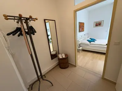 Ein Bett oder Betten in einem Zimmer der Unterkunft Giardino Airport Apartment with garden