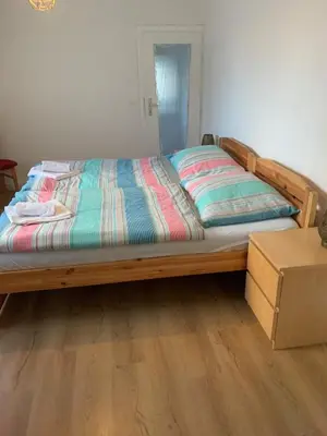 Ein Bett oder Betten in einem Zimmer der Unterkunft Cozy house with garden and bbq near Vienna