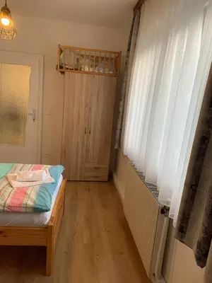 Ein Bett oder Betten in einem Zimmer der Unterkunft Cozy house with garden and bbq near Vienna