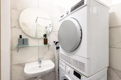Ein Badezimmer in der Unterkunft Harmony-Heights Apartment