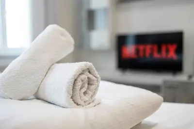Ein Bett oder Betten in einem Zimmer der Unterkunft Harmony-Heights Apartment
