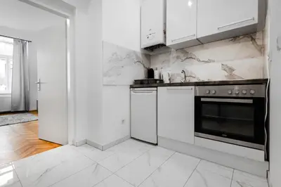 Küche/Küchenzeile in der Unterkunft Harmony-Heights Apartment