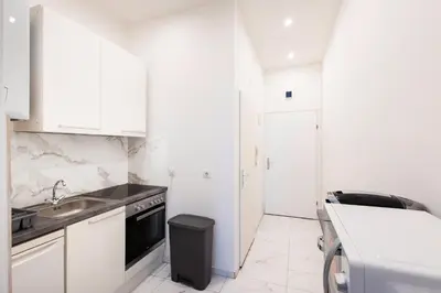 Küche/Küchenzeile in der Unterkunft Harmony-Heights Apartment