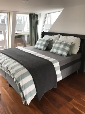 Ein Bett oder Betten in einem Zimmer der Unterkunft The Barts Apartments - Self Check-in