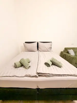 Ein Bett oder Betten in einem Zimmer der Unterkunft Enjoy Apartments New beautiful spacey Apartment amazing location