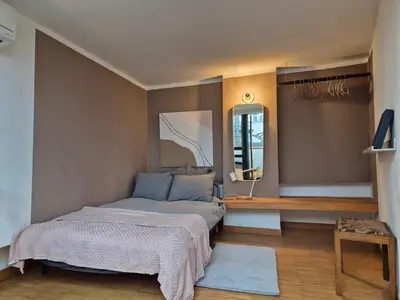 Ein Bett oder Betten in einem Zimmer der Unterkunft Rooftop Loft