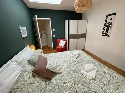 Ein Bett oder Betten in einem Zimmer der Unterkunft Wiener Townhouse Riesenrad