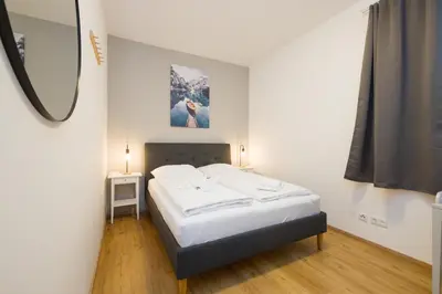 Ein Bett oder Betten in einem Zimmer der Unterkunft Cosy Penzing