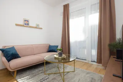 Ein Sitzbereich in der Unterkunft Cosy Penzing