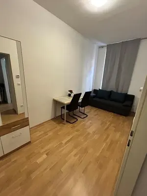 Ein Sitzbereich in der Unterkunft Cozy 2 rooms family apartment