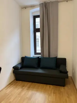Ein Sitzbereich in der Unterkunft Cozy 2 rooms family apartment